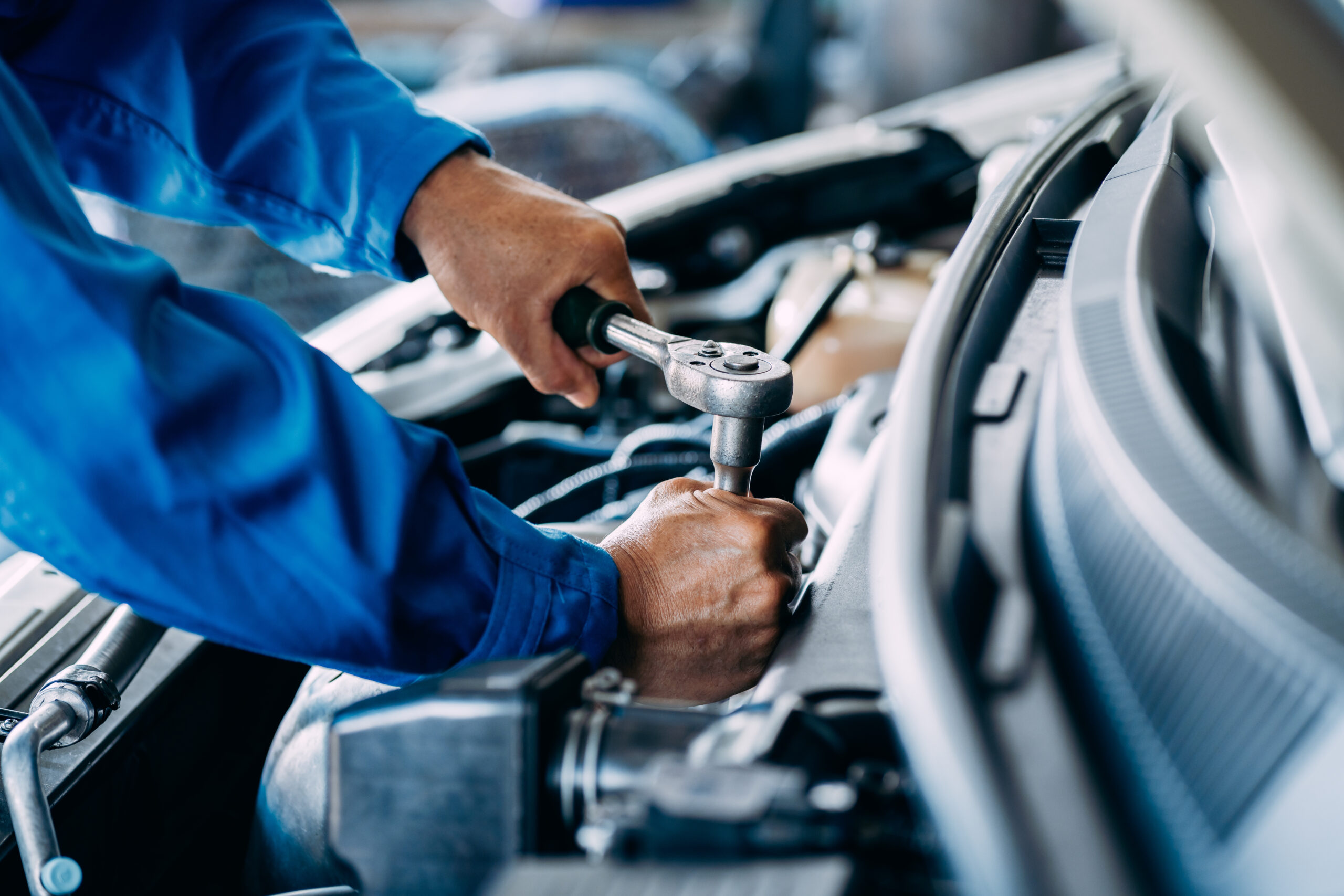 Mechanic performing vehicle inspection
